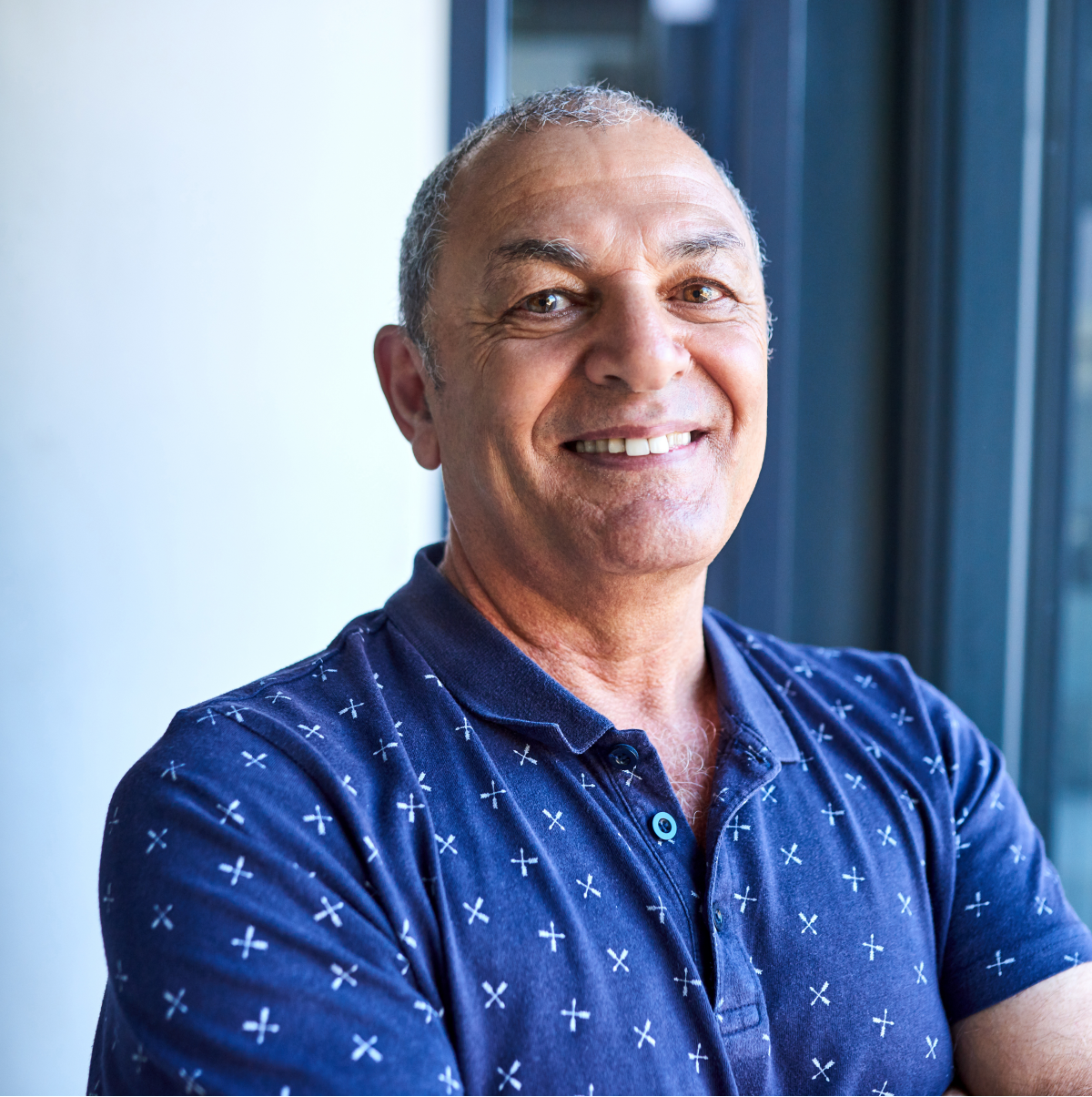 Cropped shot of a senior man looking happy at home